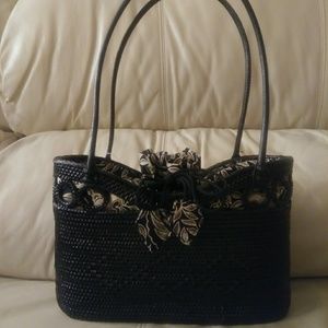 Gorgeous TLC black wicker bag with floral printed cloth design